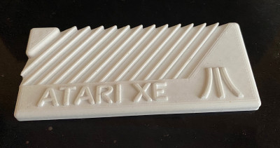 test z PETG 115x50x5mm, origo bude šedé PLA